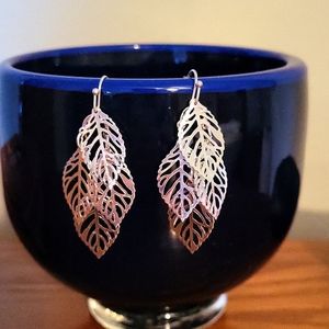 Silver leaf pierced earrings. 4 leafs tiered.  Length 2".